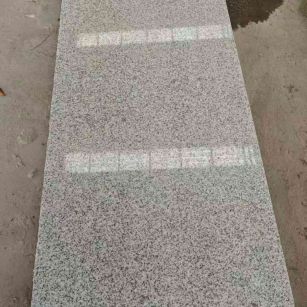 德州芝麻白光面毛板